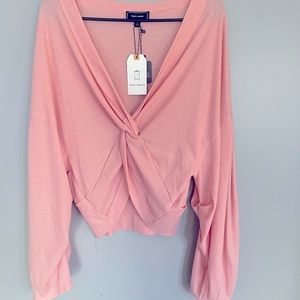 Romantic pink, Kaylas Armoire brand knotted blouse. New with tags. Size L